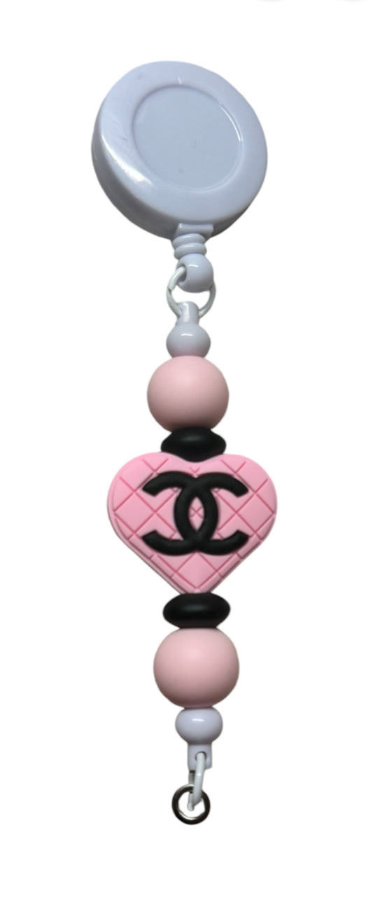 Pink Chanel Badge Holder w/ reel